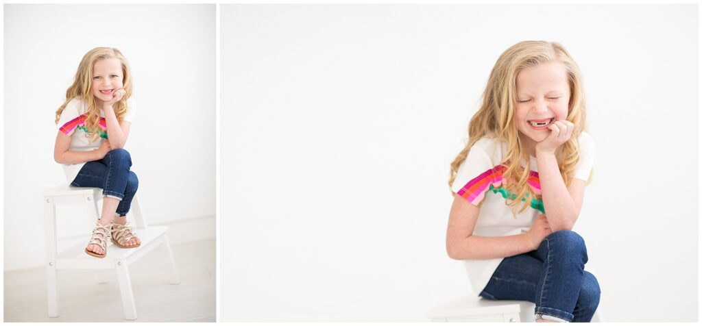 little girl with toothless grin during photos at Tiffany Hix's boise photography studio