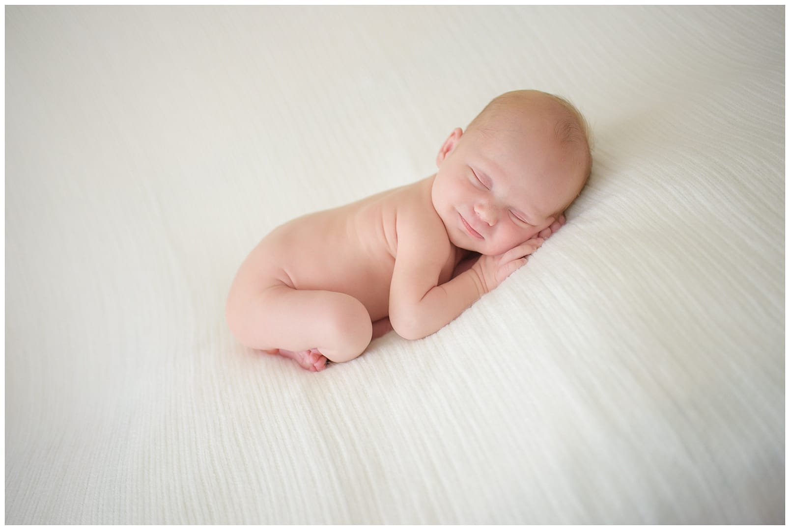 Smiling baby in studio. Photos by Tiffany Hix Photography.