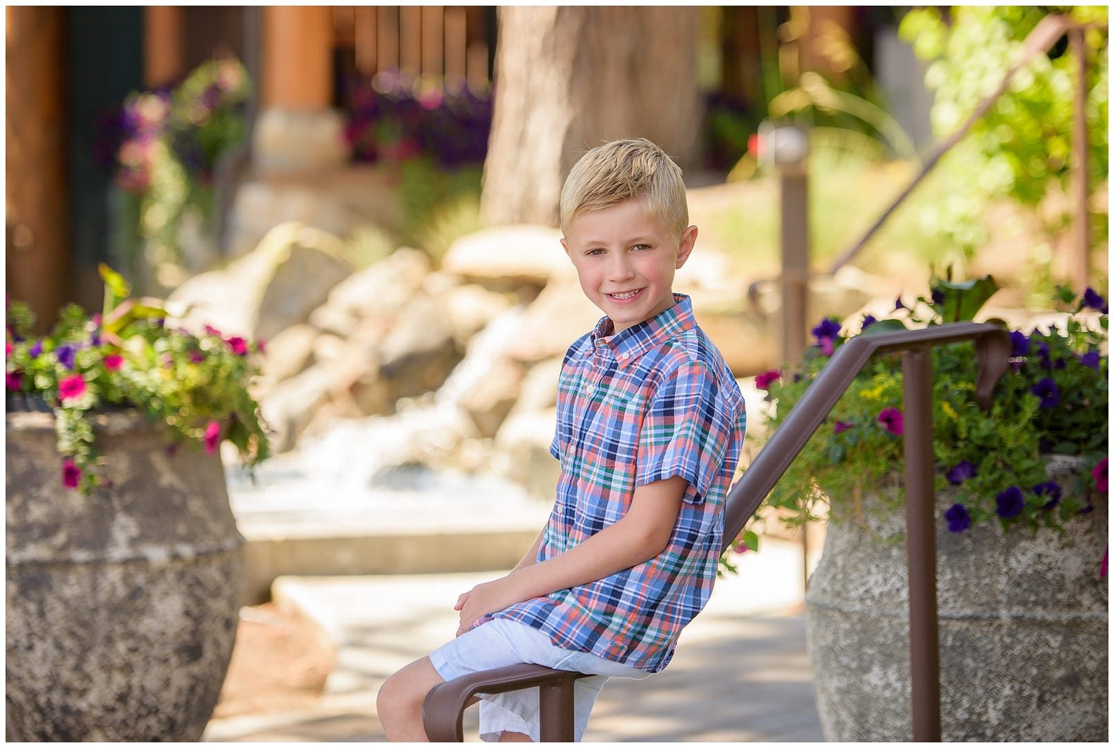Young child poses during McCall family photos. Photo by Tiffany Hix Photography.