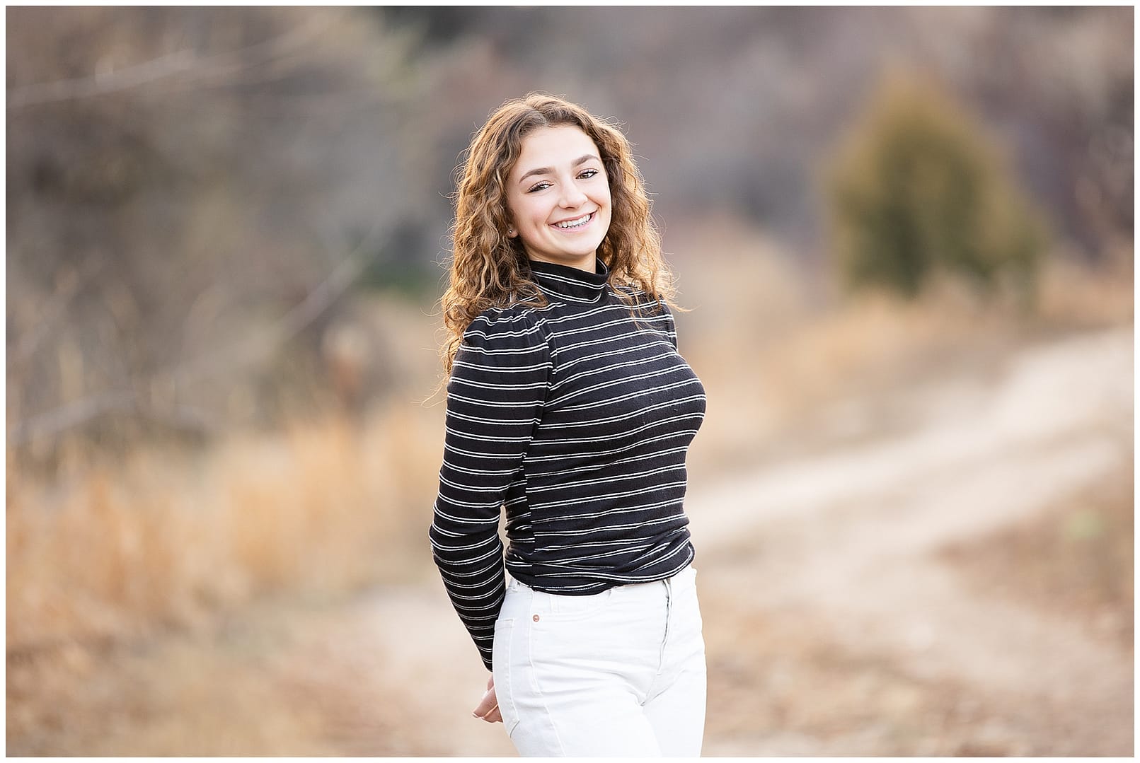Tween poses in Boise,ID open space. Photos by Tiffany Hix Photography.