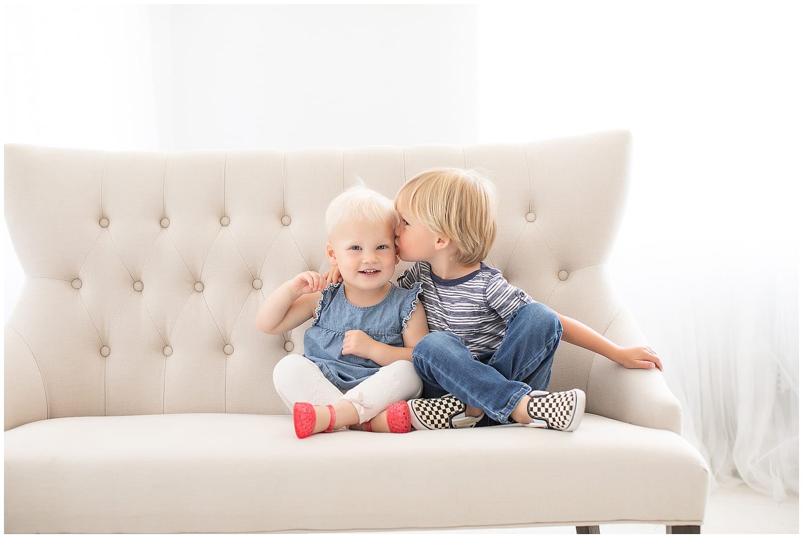 Siblings embrace in Boise studio session. Photos by Tiffany Hix Photography.