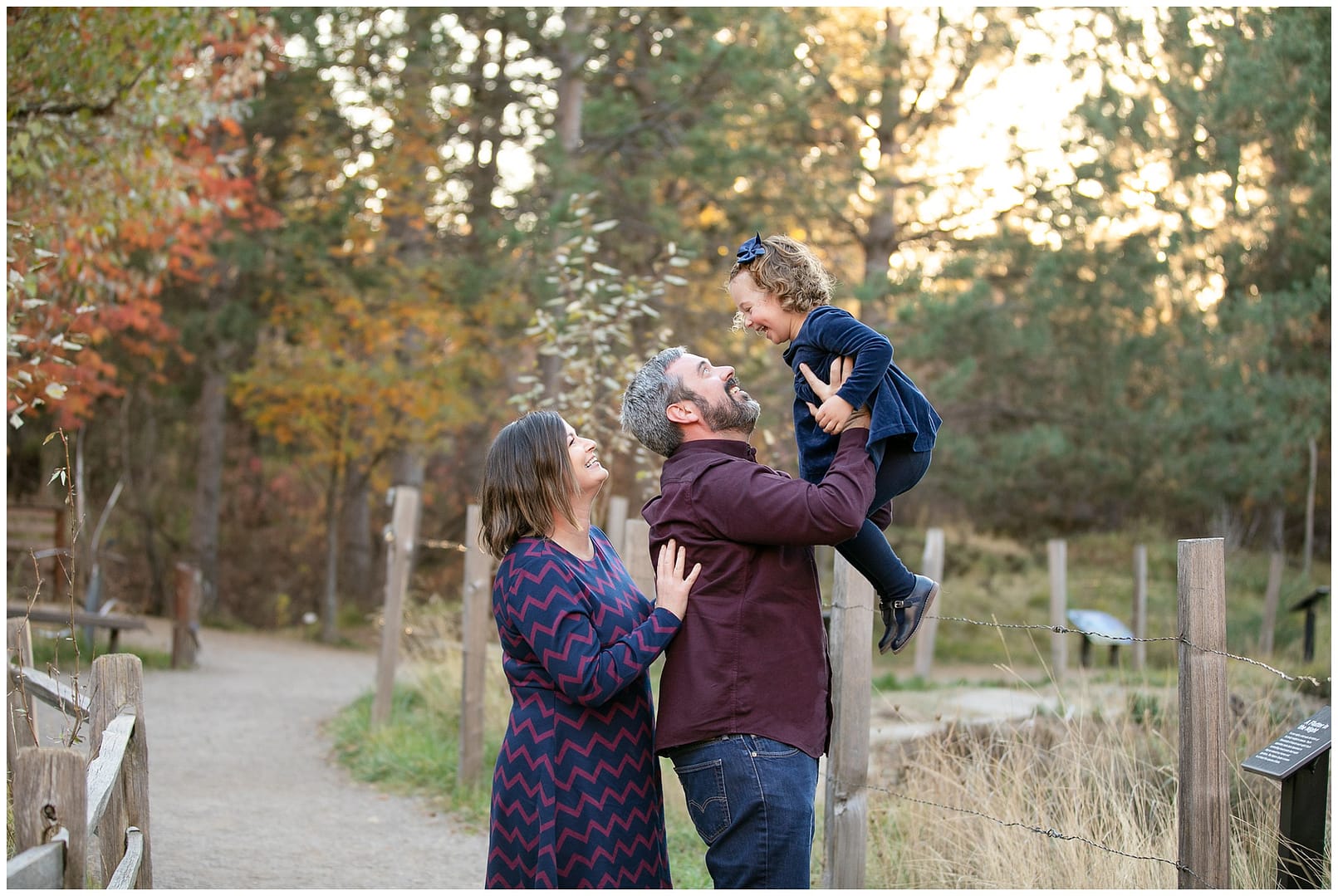 Little girl smiles during Boise family photos. Photo by Tiffany Hix Photography.