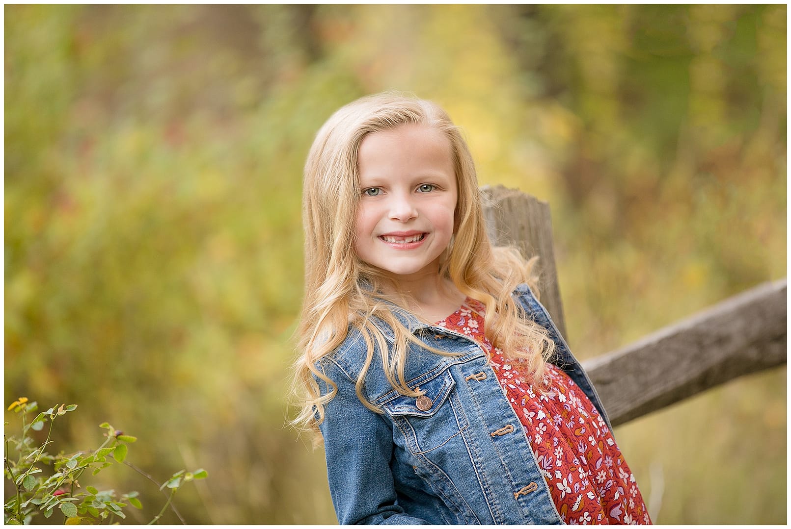 Child poses for portrait. Photo by Tiffany Hix Photography.
