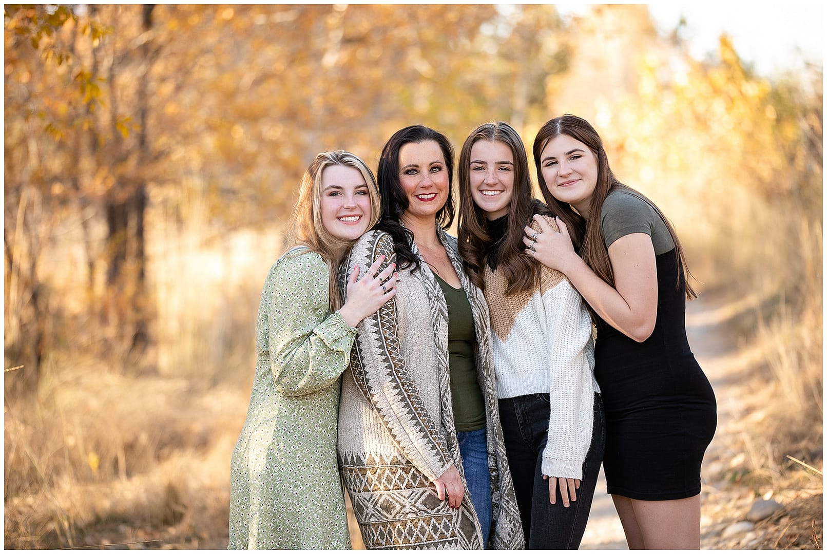 Mom with her three daughters in Boise,ID. Photo by Tiffany Hix Photography.