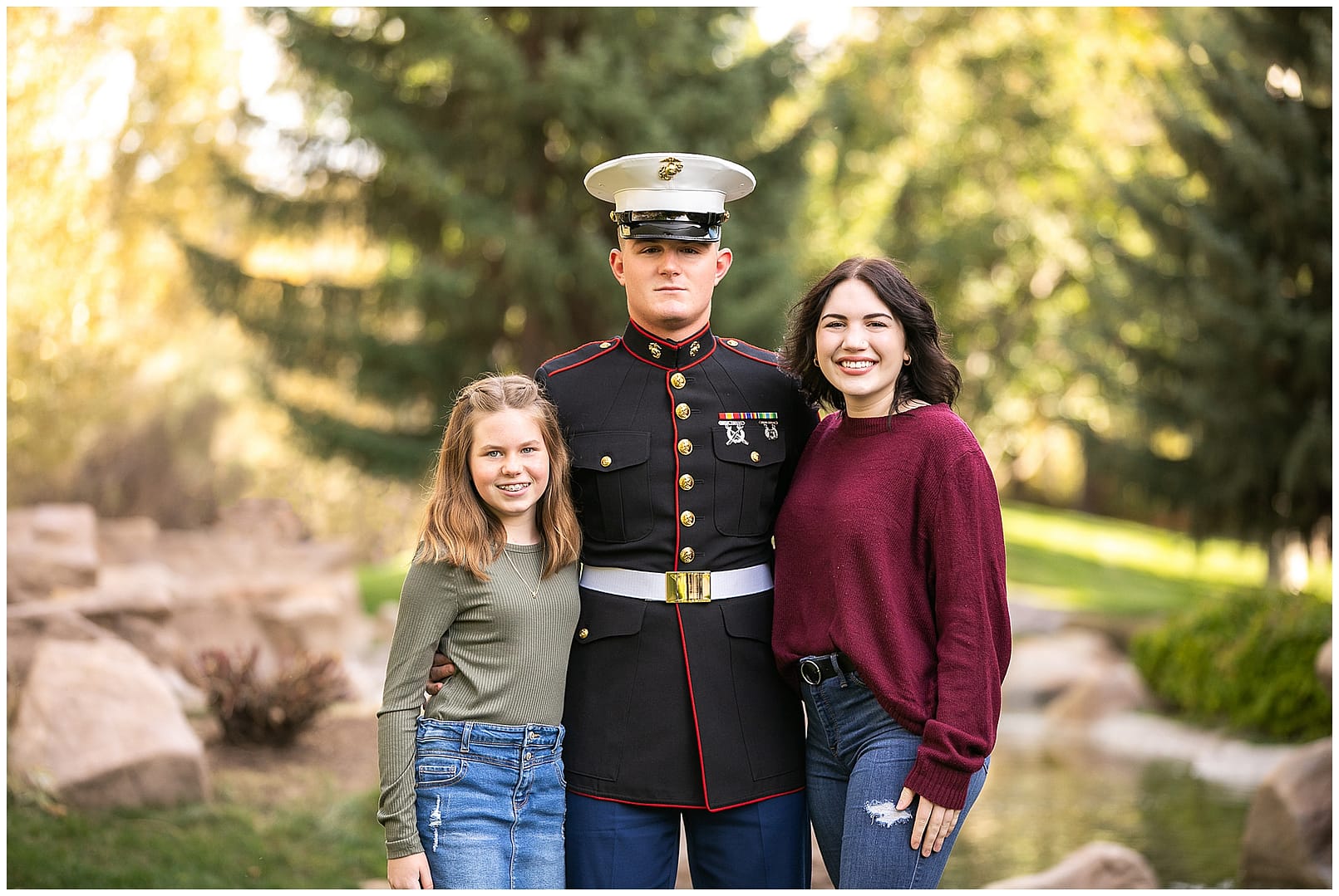 Young man in dress blues with siblings. Photo by Tiffany Hix Photography.