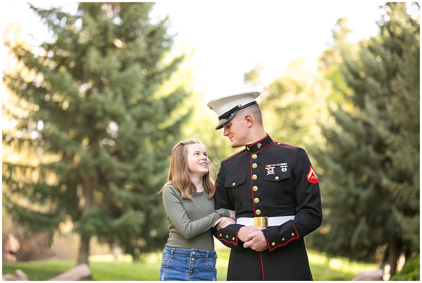 Young man and youngest sibling share a special moment. Photo by Tiffany Hix Photography.