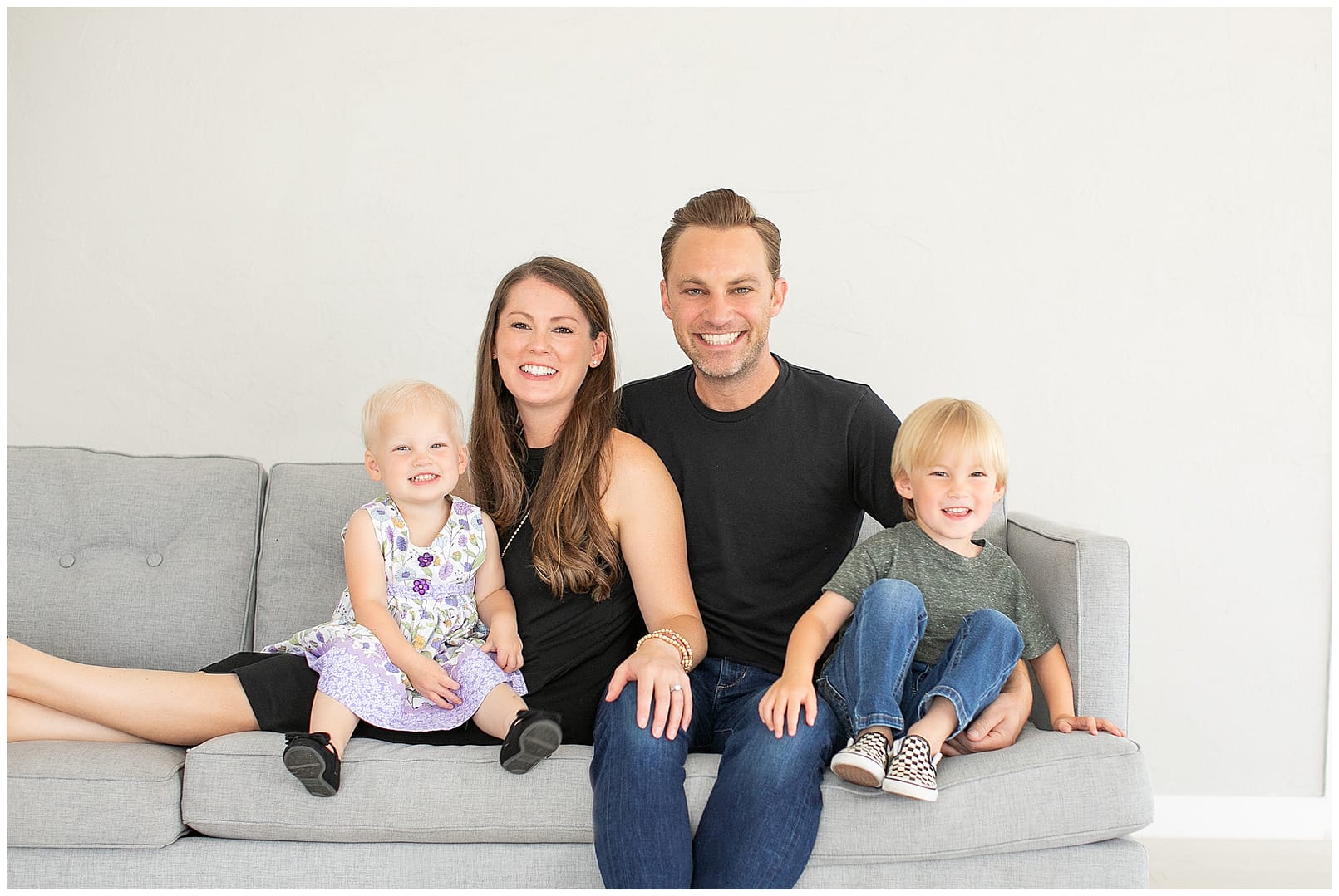Family of four poses in Boise studio. Photos by Tiffany Hix Photography.