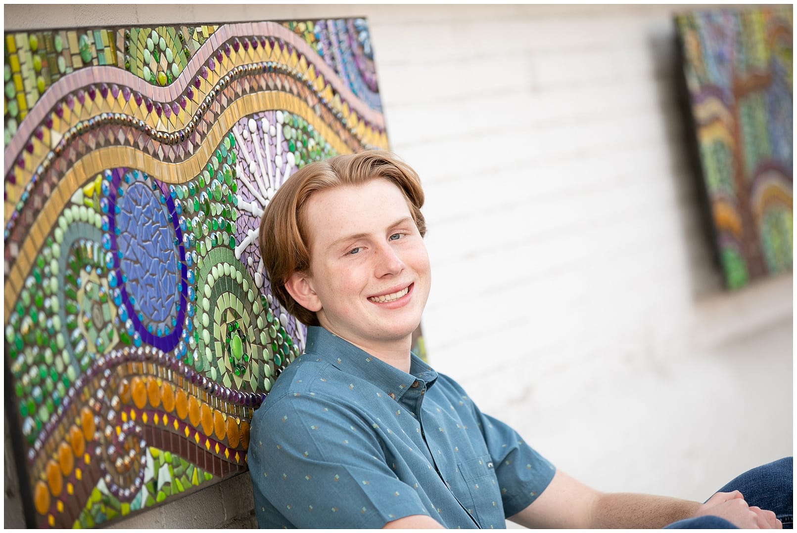 Teenager poses against colorful mural in Boise. Photos by Tiffany Hix Photography.