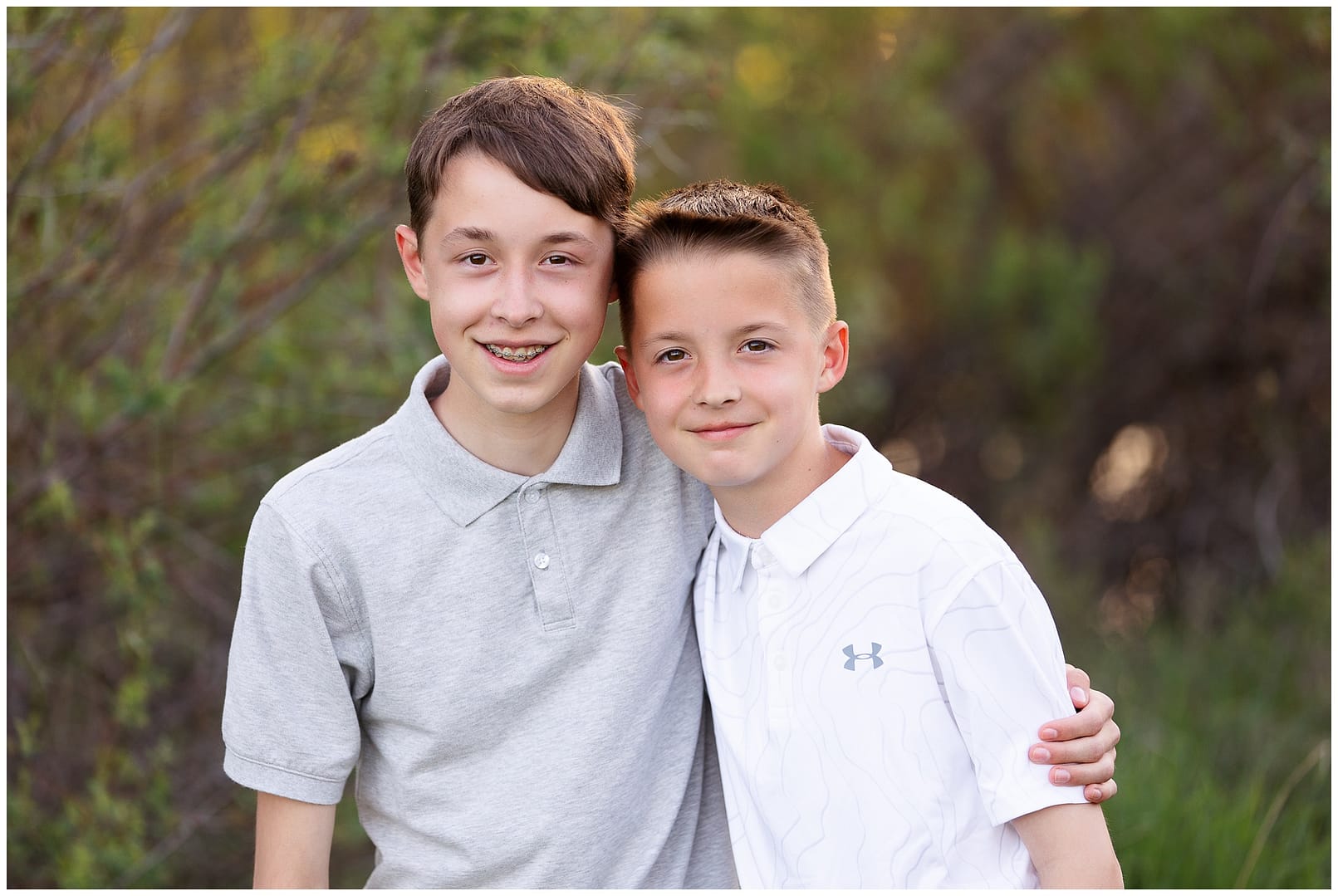 Brothers pose for Boise family photos. Photos by Tiffany Hix Photography.