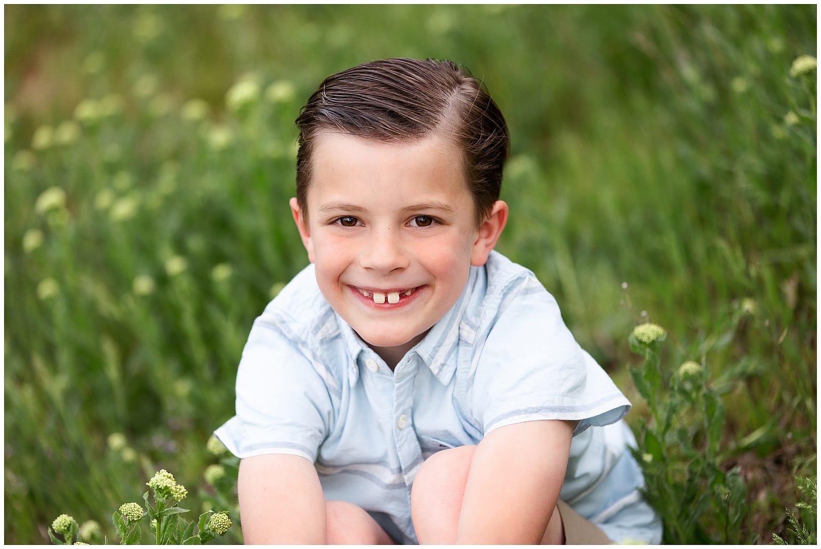 8 year old smiles for camera in Meridian, ID. Photo by Tiffany Hix Photography.