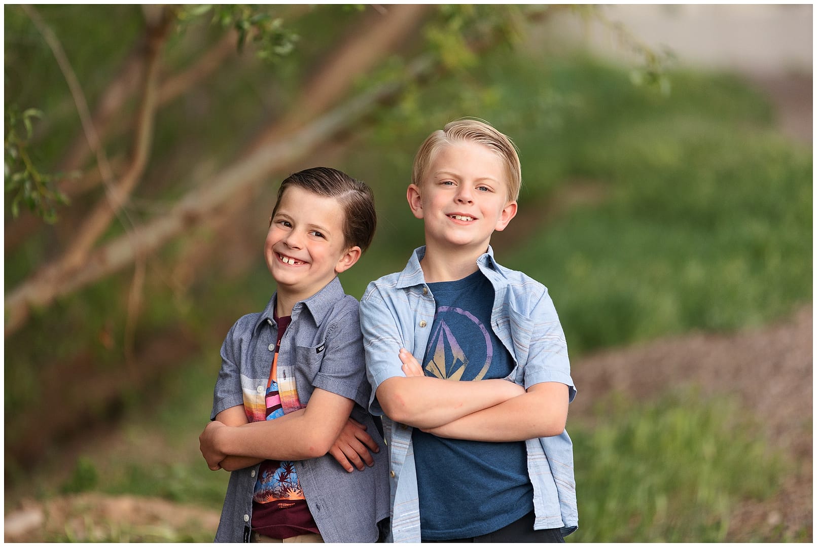 Twin brother pose for portrait in Meridian, ID. Photo by Tiffany Hix Photography.