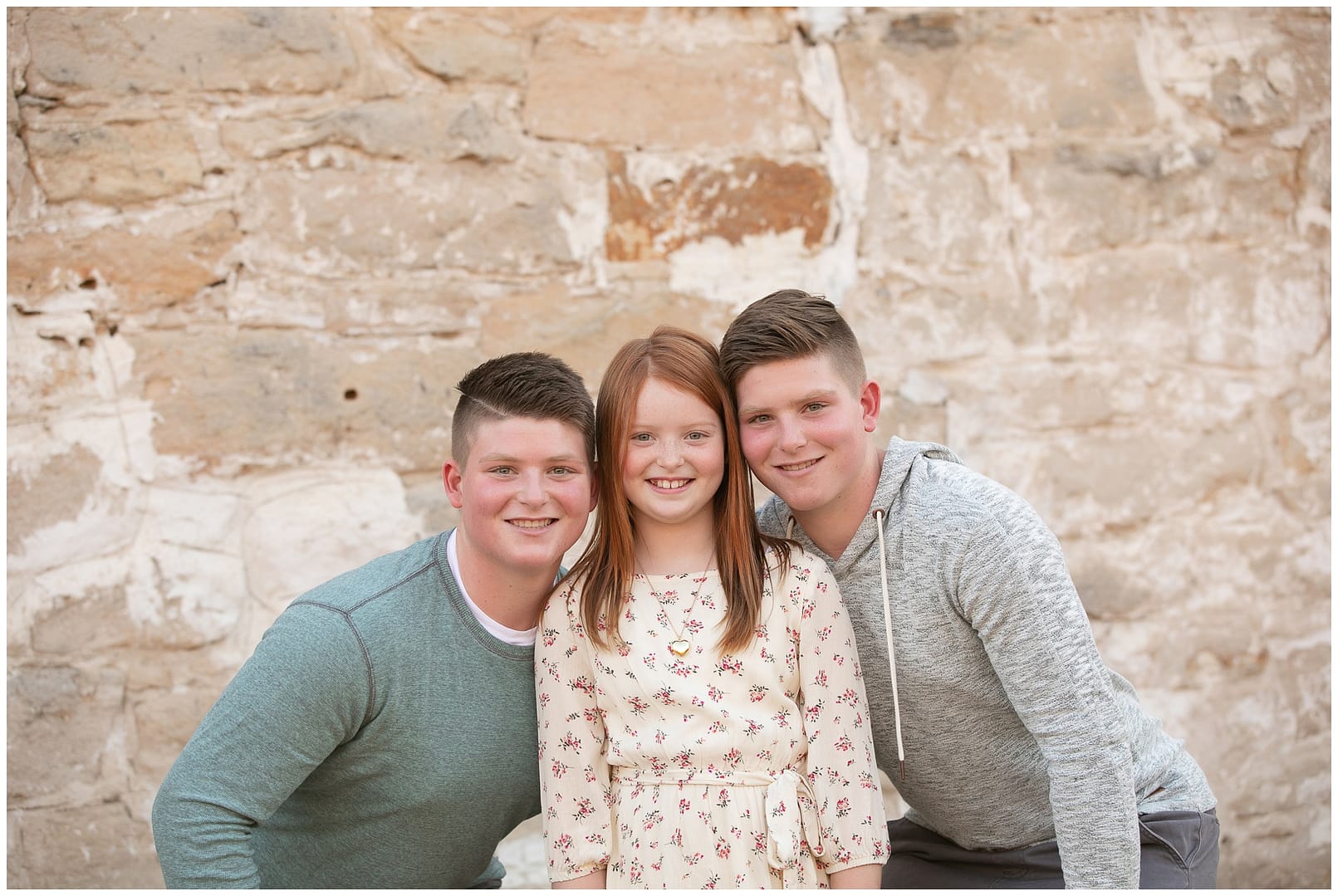 Twin brothers and their younger sister. Photo by Tiffany Hix Photography.