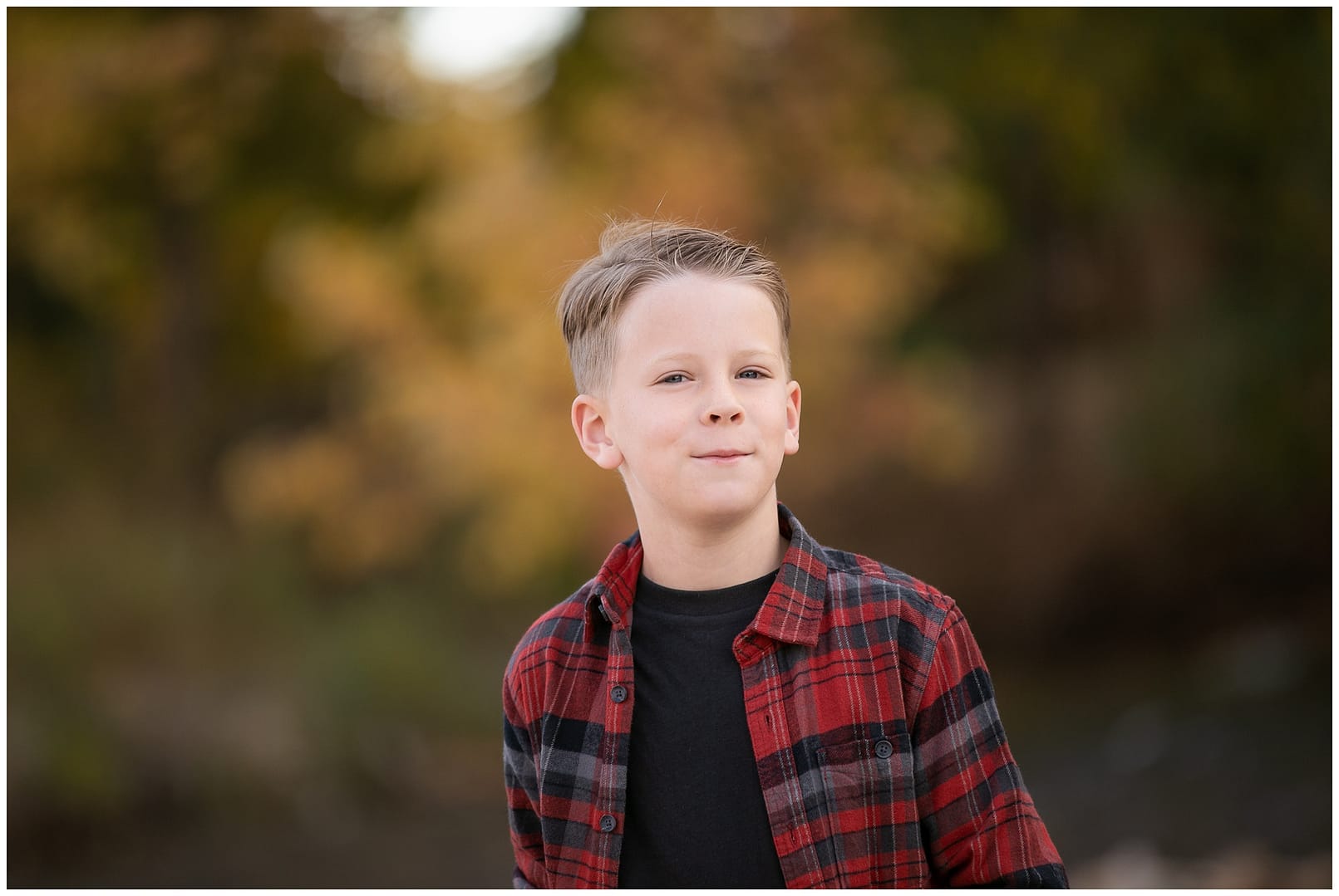 Young boy in red and black flannel. Photos by Tiffany Hix Photography.