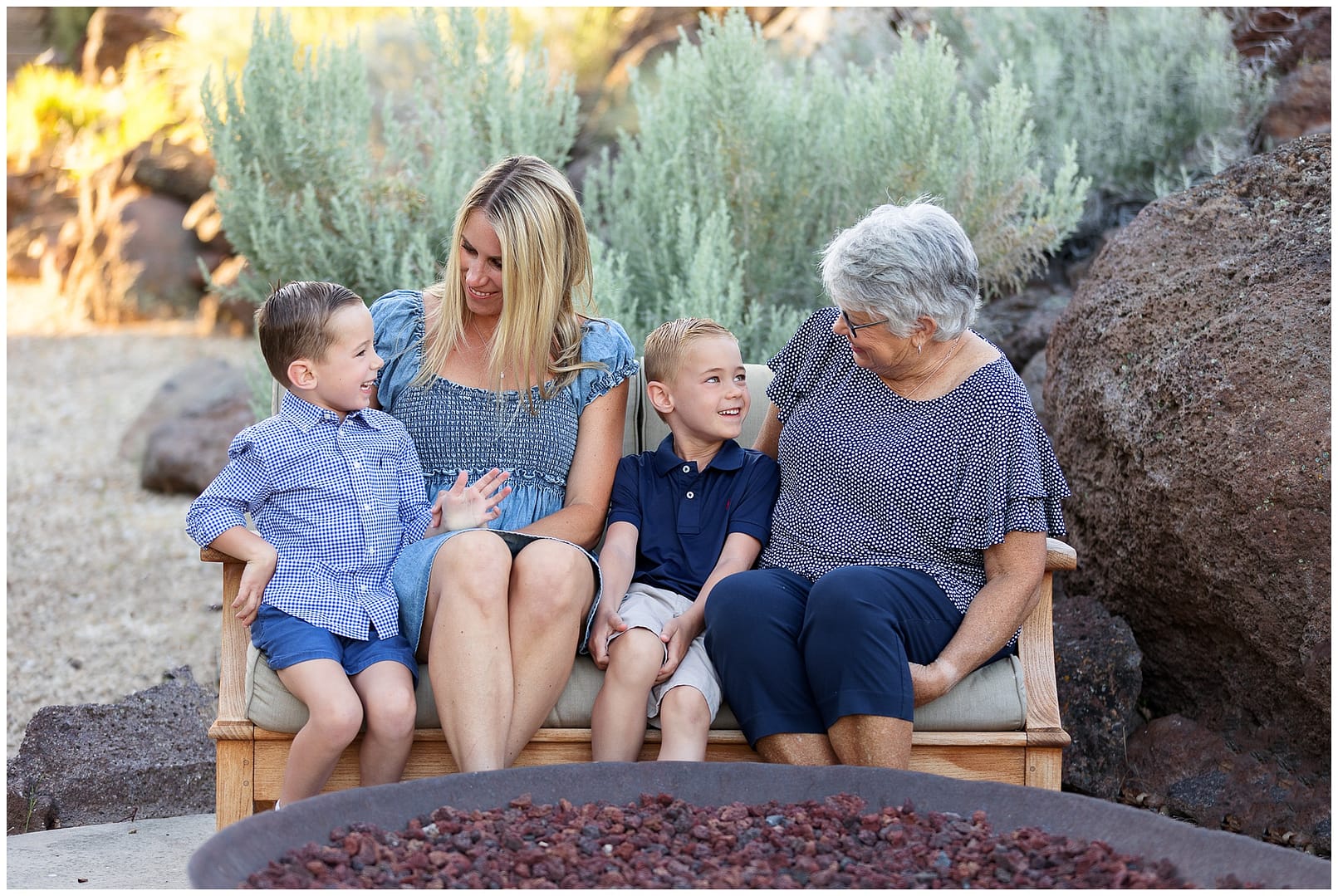 Three generations of family sit on a bench. Photo by Tiffany Hix Photography.