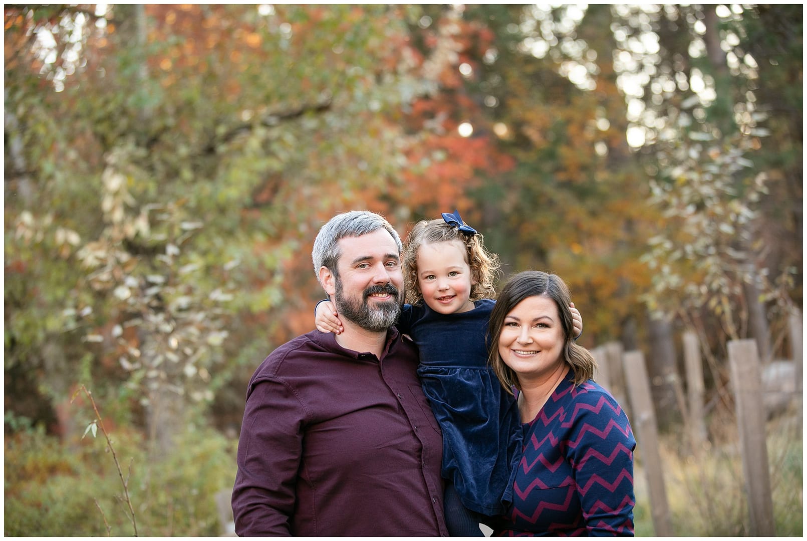 Mom, dad & daughter in Boise open space. Photo by Tiffany Hix Photography.