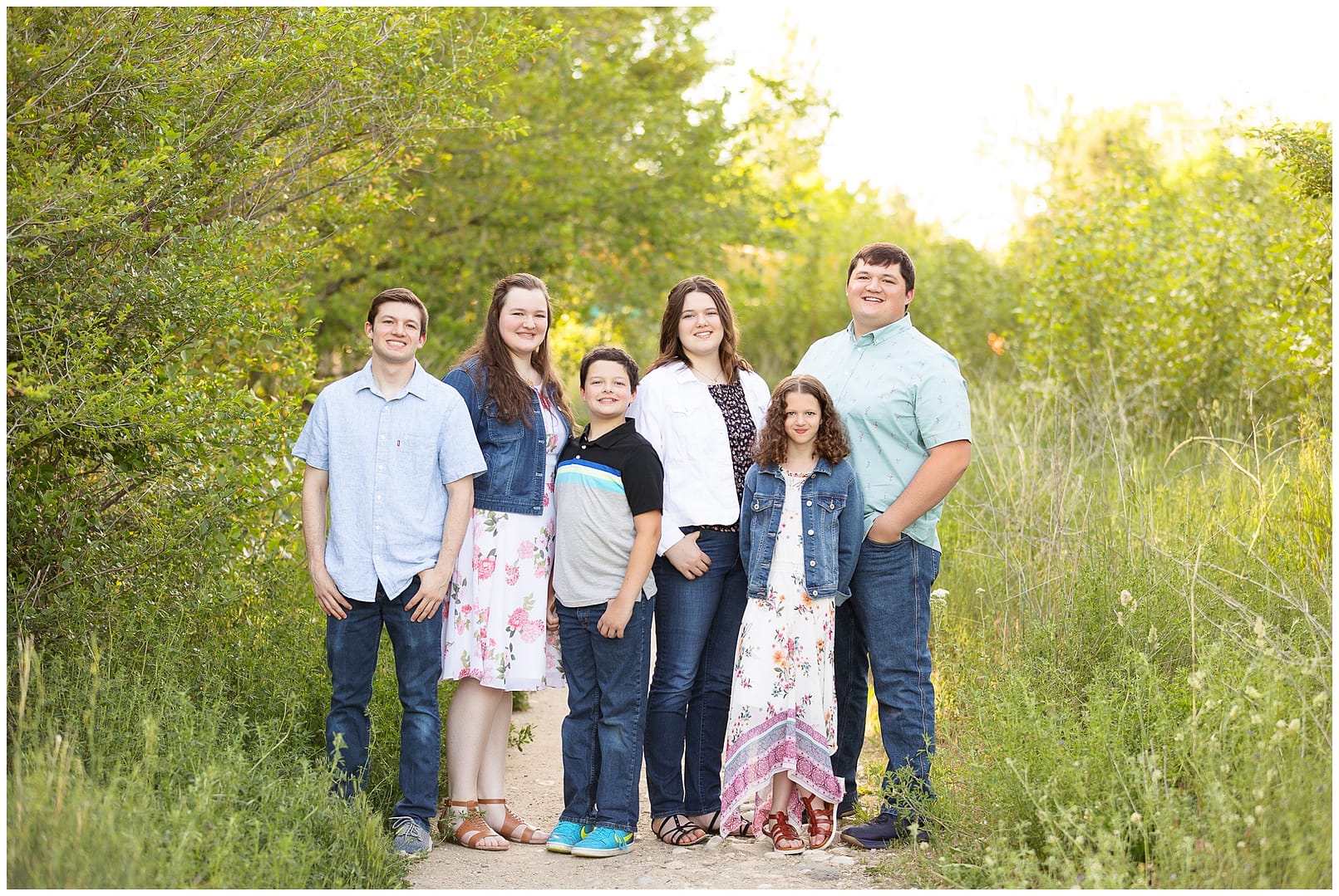 Six siblings pose for photograph. Photo by Tiffany Hix Photography.