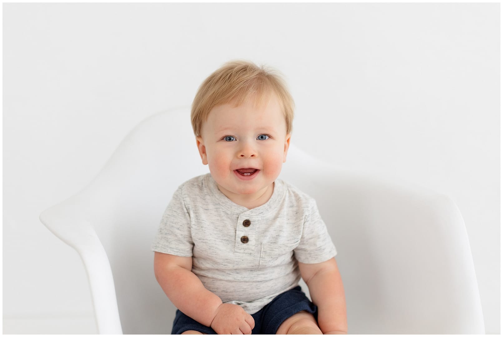 Sweet smiles from baby boy during milestone studio session. Photo by Tiffany Hix Photography. 