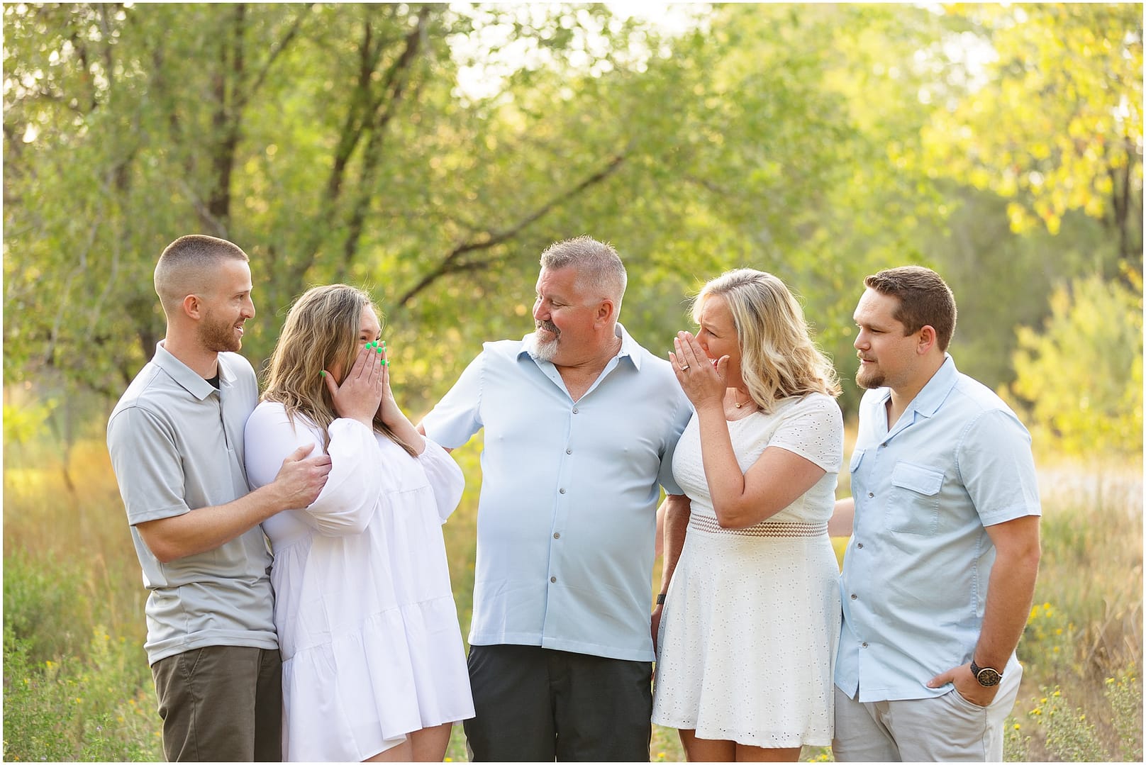 Parents are overjoyed upon learning of daughters pregnancy during Boise family photoshoot. Photo by Tiffany Hix Photography.