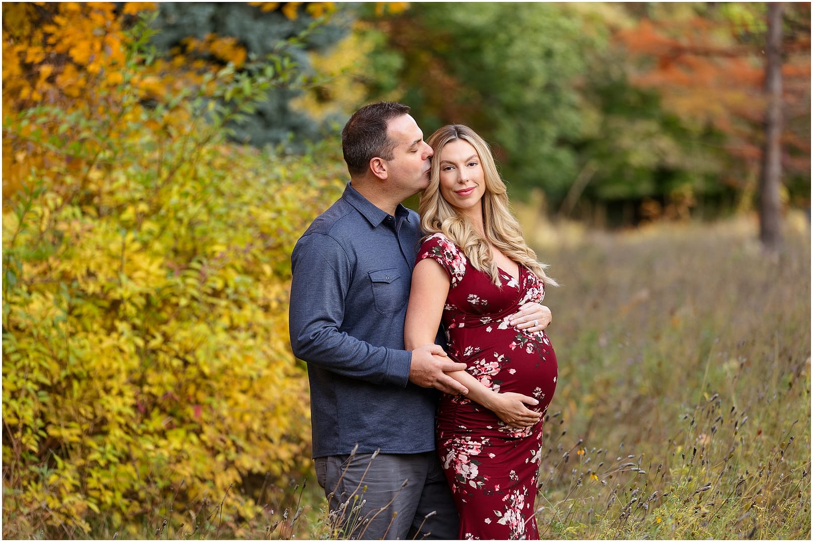 Dad kisses mom to be during Boise maternity shoot. Photo by Tiffany Hix Photography.