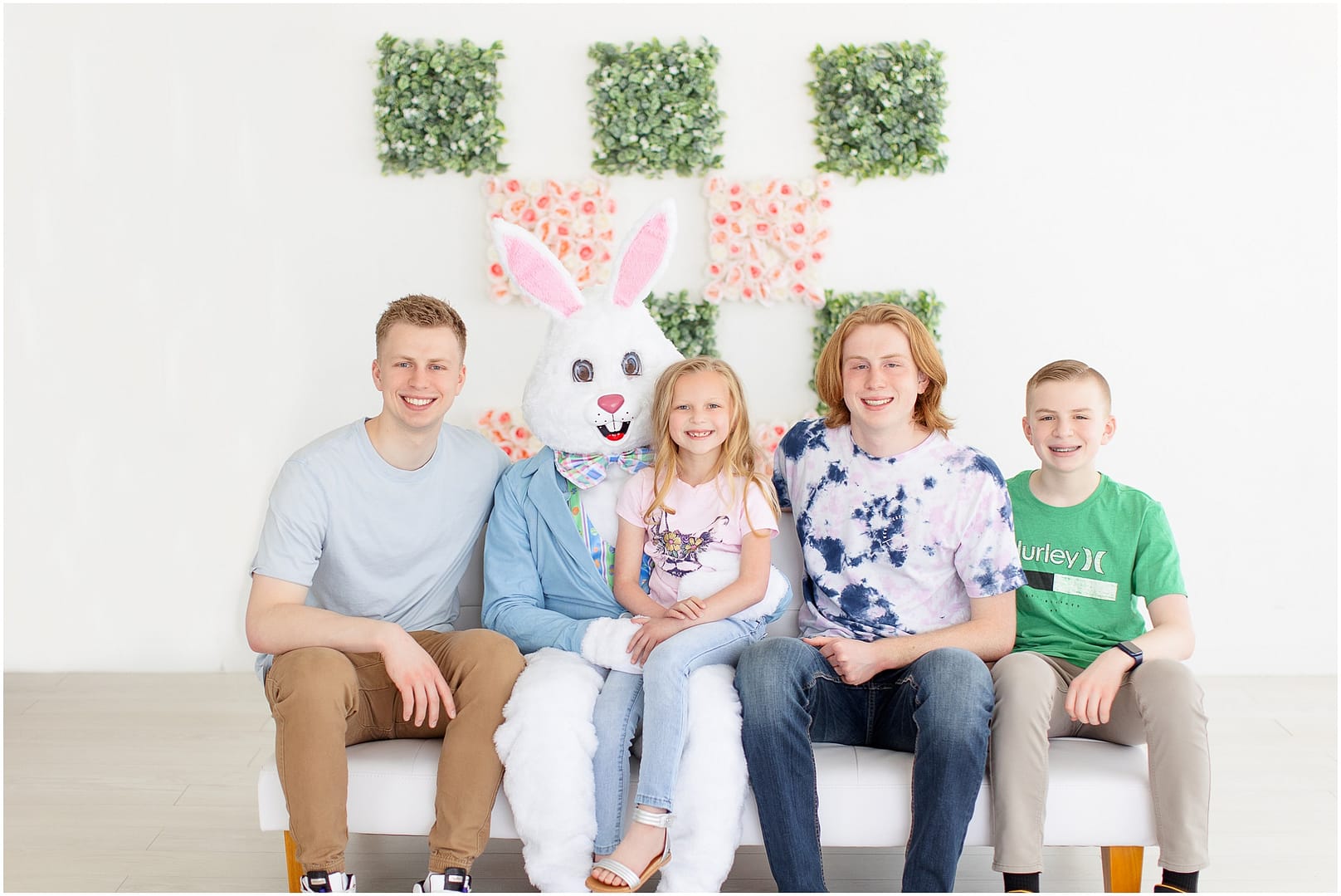 Four children and the Easter Bunny sit for a portrait in Boise studio. Photo by Tiffany Hix Photography.
