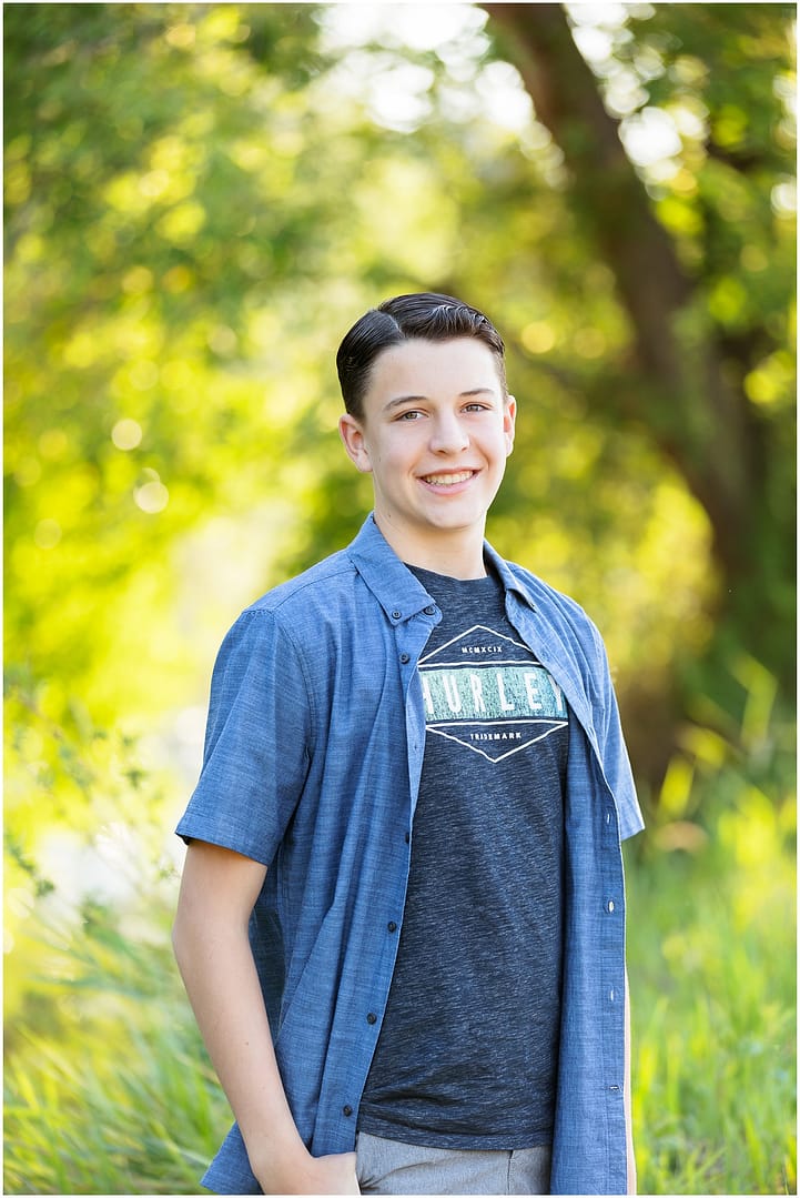 Young man is photographed during teen boy Boise portrait session. Photo by Tiffany Hix Photography.