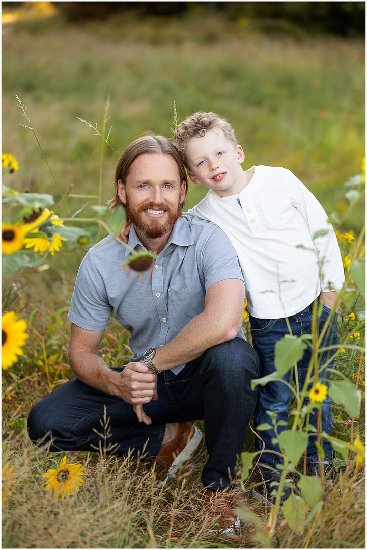 Dad and son pose for portrait among Boise wildflowers. Photo by Tiffany Hix Photography.
