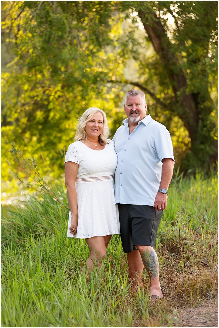 Mom and Dad stand for portrait for Boise family photos. Photo by Tiffany Hix Photography.