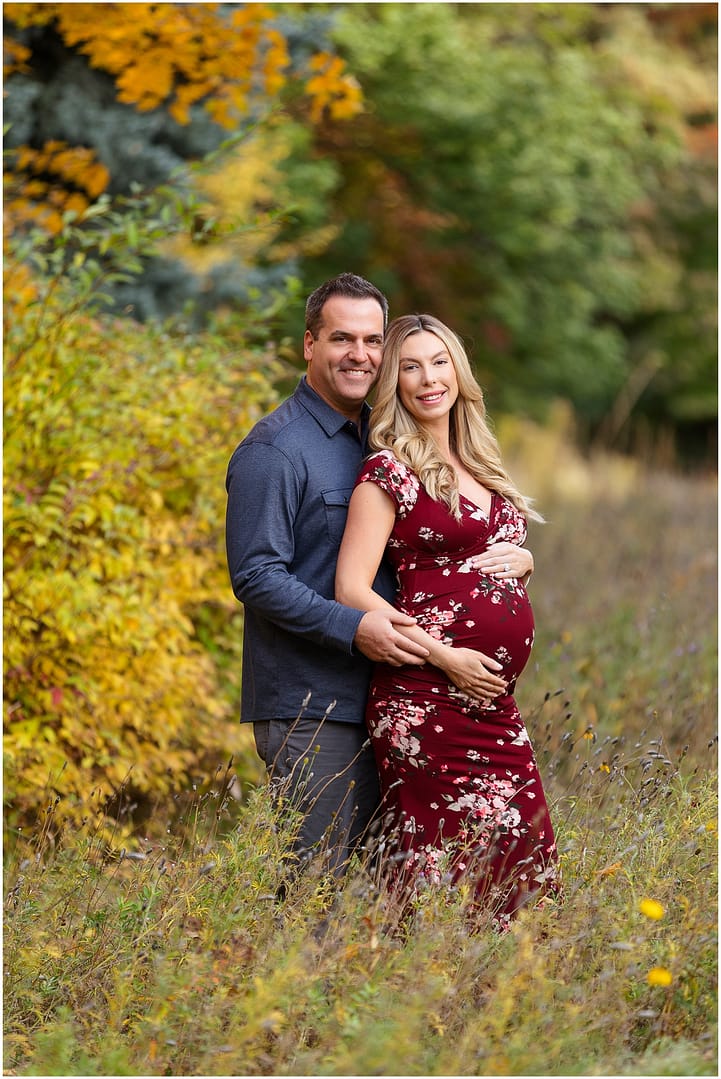 Mom & Dad embrace baby bump during Boise maternity session. Photo by Tiffany Hix Photography.
