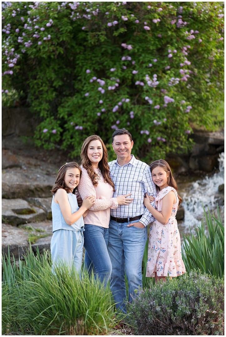 Family of four poses for portrait. Photos by Tiffany Hix Photography.