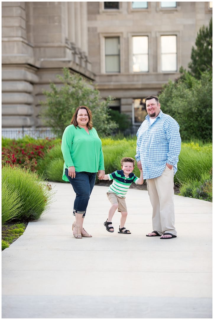 Family of three poses in Downtown Boise. Photos by Tiffany Hix Photography.