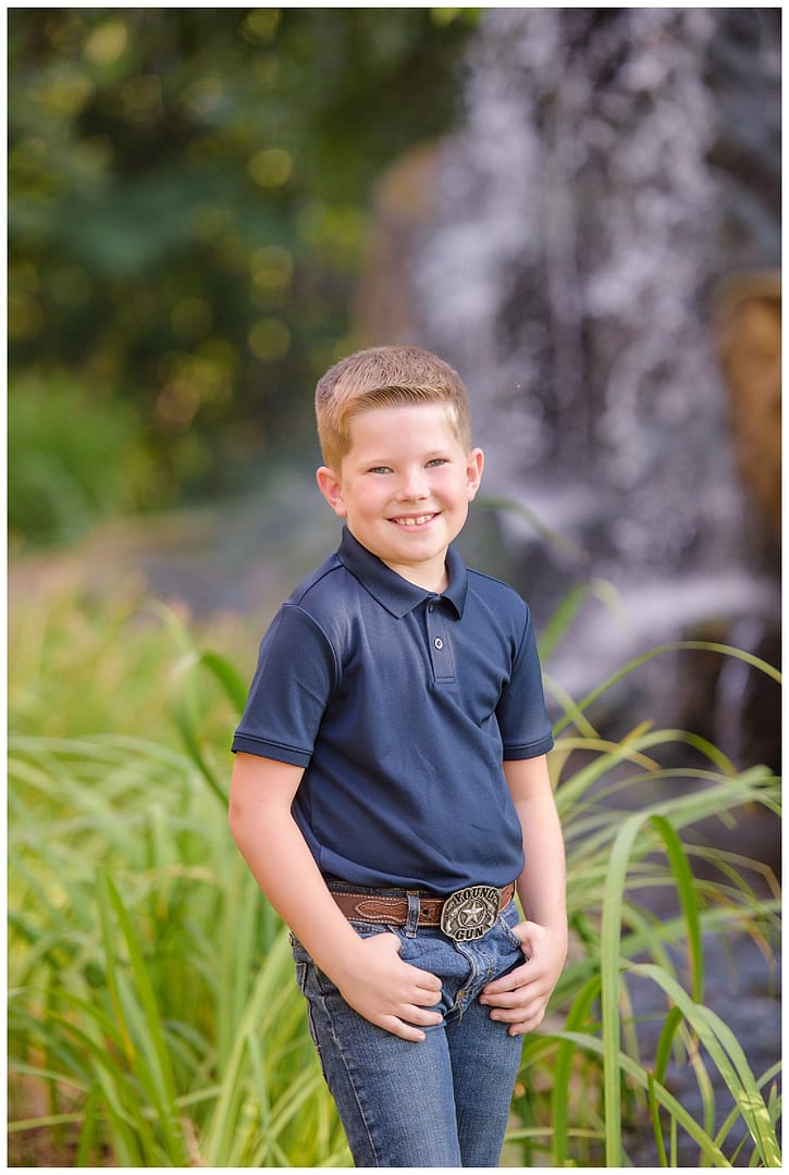 Young boy smiles for photograph. Photos by Tiffany Hix Photography.