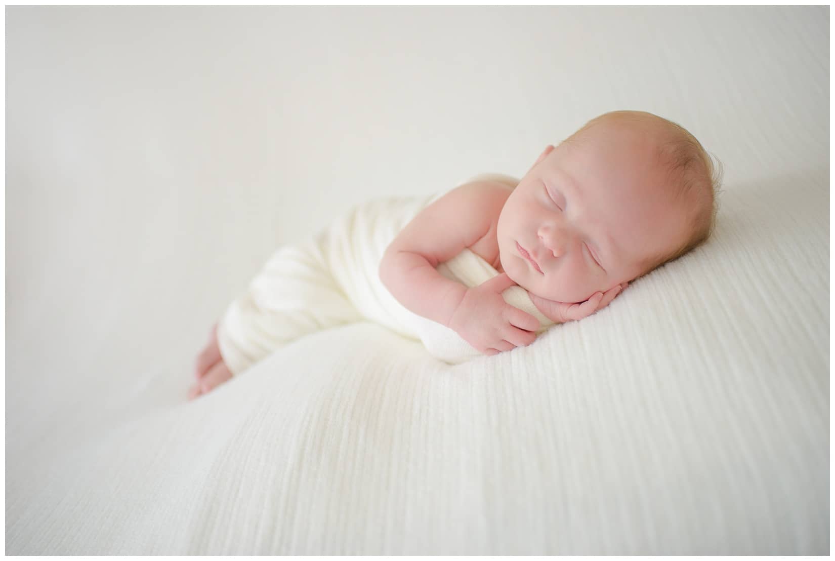 Newborn baby posed in Boise studio. Photos by Tiffany Hix Photography.